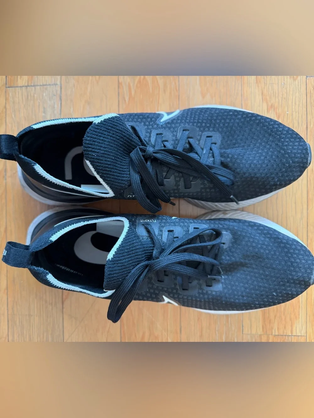 Nike Men's React Flyknit Black and White Running Shoes